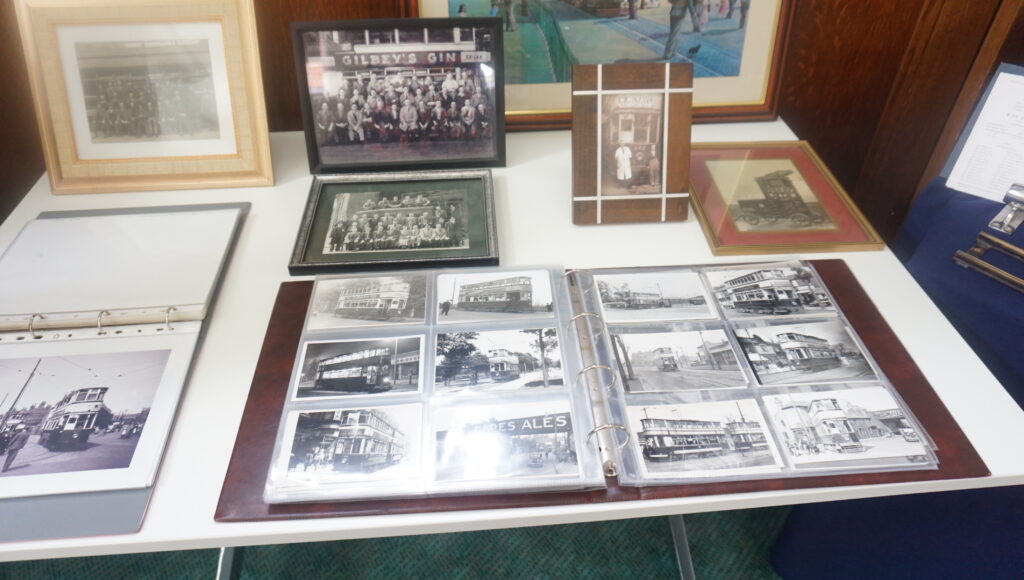 A picture of a photo book and other pictures of the history of trams