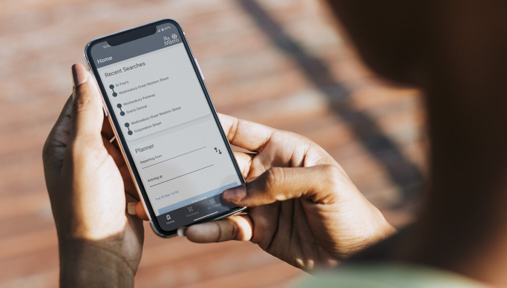 User using the MyMetro App on Mobile